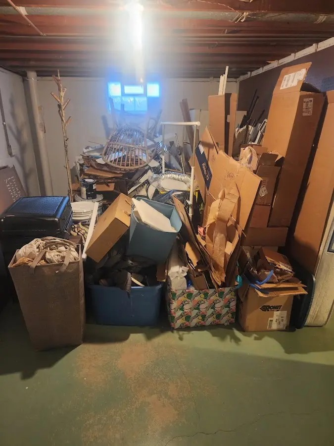 Roll-off dumpster container at job site for 15 Yard Dumpster Rental in Chatfield